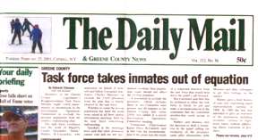 newspaper scan showing the headline 'inmates taken out of equation'